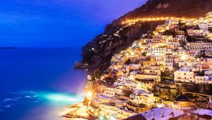 Preview wallpaper city, mountain, light, sea, twilight, evening