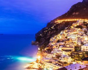 Preview wallpaper city, mountain, light, sea, twilight, evening