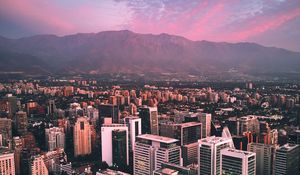 Preview wallpaper city, mountains, buildings, roofs, aerial view