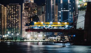 Preview wallpaper city, night, buildings, architecture, lights, river