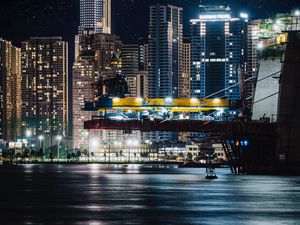 Preview wallpaper city, night, buildings, architecture, lights, river