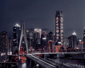 Preview wallpaper city, night city, bridge, buildings, lights, hieroglyphs