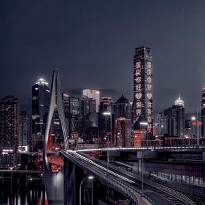 Preview wallpaper city, night city, bridge, buildings, lights, hieroglyphs