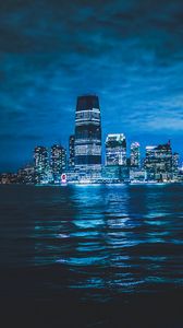 Preview wallpaper city, night city, lights, buildings, sea