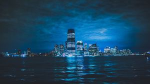 Preview wallpaper city, night city, lights, buildings, sea