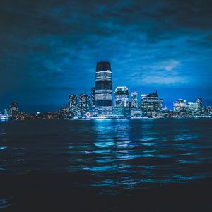 Preview wallpaper city, night city, lights, buildings, sea