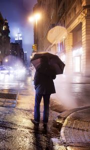 Preview wallpaper city, night, cloudy, lonely, man, umbrella