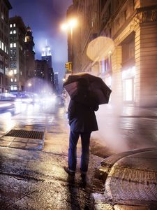 Preview wallpaper city, night, cloudy, lonely, man, umbrella