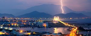 Preview wallpaper city, night, lights, mountains, lightning