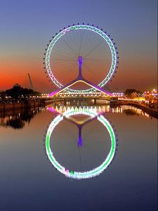 Preview wallpaper city, night, lights, wheel, house, river, reflection
