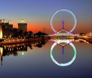 Preview wallpaper city, night, lights, wheel, house, river, reflection