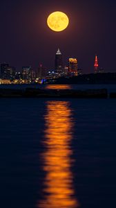 Preview wallpaper city, night, moon, buildings, water, reflection