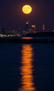 Preview wallpaper city, night, moon, buildings, water, reflection