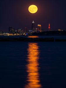 Preview wallpaper city, night, moon, buildings, water, reflection
