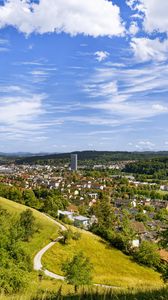 Preview wallpaper city, panorama, hills, trees, forest, sky, clouds