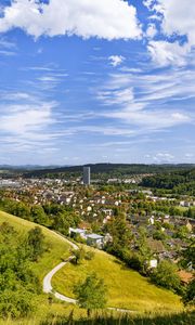 Preview wallpaper city, panorama, hills, trees, forest, sky, clouds