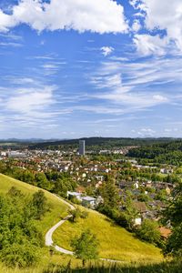 Preview wallpaper city, panorama, hills, trees, forest, sky, clouds