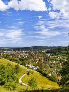 Preview wallpaper city, panorama, hills, trees, forest, sky, clouds