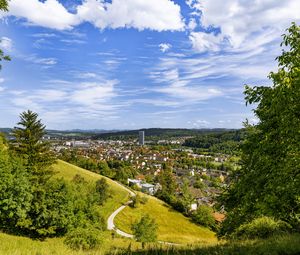 Preview wallpaper city, panorama, hills, trees, forest, sky, clouds