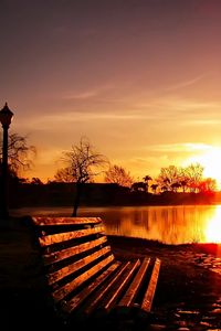 Preview wallpaper city, park, sunset, bench, landscape, light