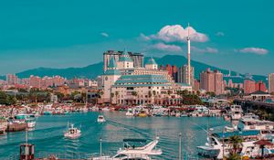 Preview wallpaper city, port, boats, water, buildings, mountains
