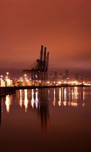 Preview wallpaper city, port, cranes, lights, light, reflection