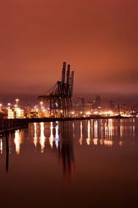 Preview wallpaper city, port, cranes, lights, light, reflection