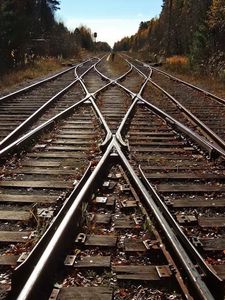 Preview wallpaper city, railroad, road, trees