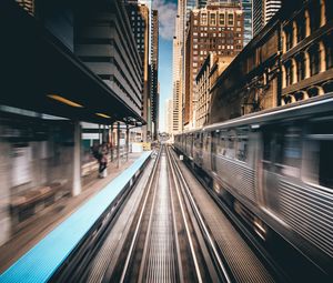 Preview wallpaper city, rails, railway, platform, train, movement