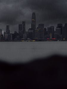 Preview wallpaper city, rain, buildings, river, coast