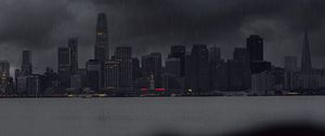 Preview wallpaper city, rain, buildings, river, coast