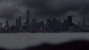 Preview wallpaper city, rain, buildings, river, coast