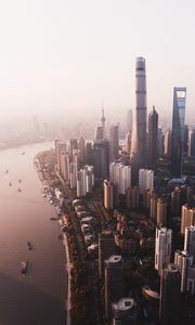 Preview wallpaper city, river, aerial view, buildings, fog, metropolis