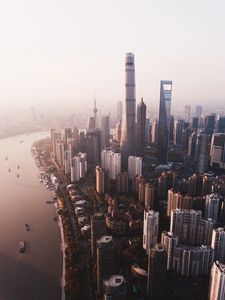 Preview wallpaper city, river, aerial view, buildings, fog, metropolis
