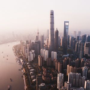 Preview wallpaper city, river, aerial view, buildings, fog, metropolis