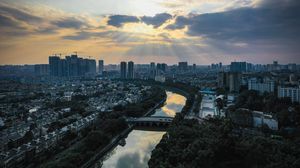 Preview wallpaper city, river, aerial view, buildings, cityscape