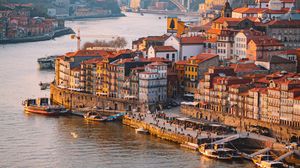 Preview wallpaper city, river, boats, buildings, aerial view