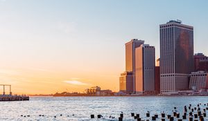 Preview wallpaper city, river, buildings, sun