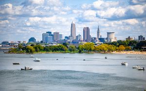 Preview wallpaper city, river, buildings, boats, water