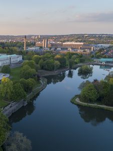 Preview wallpaper city, river, buildings, aerial view, overview