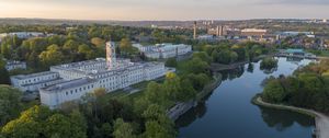 Preview wallpaper city, river, buildings, aerial view, overview