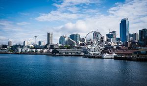 Preview wallpaper city, river, coast, buildings, ferris wheel, view