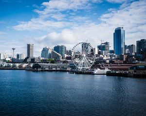 Preview wallpaper city, river, coast, buildings, ferris wheel, view