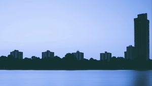 Preview wallpaper city, river, evening, buildings