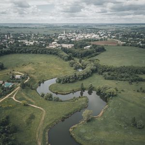 Preview wallpaper city, river, winding, trees, horizon