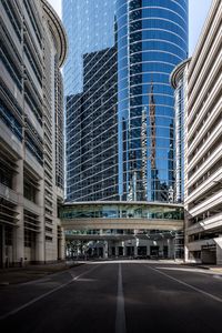Preview wallpaper city, road, buildings, modern, reflection