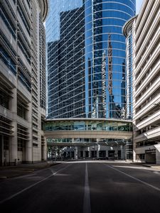 Preview wallpaper city, road, buildings, modern, reflection