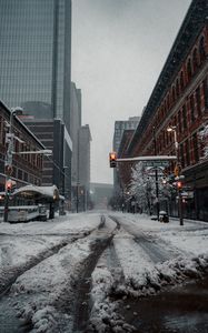 Preview wallpaper city, road, buildings, snow, winter, bottom view