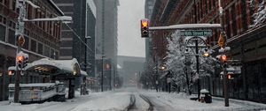 Preview wallpaper city, road, buildings, snow, winter, bottom view