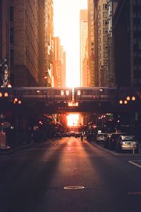 Preview wallpaper city, road, buildings, train, street, sunset